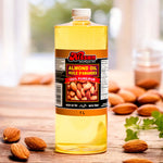 A bottle of Kissan Almond Oil 1L with almonds around