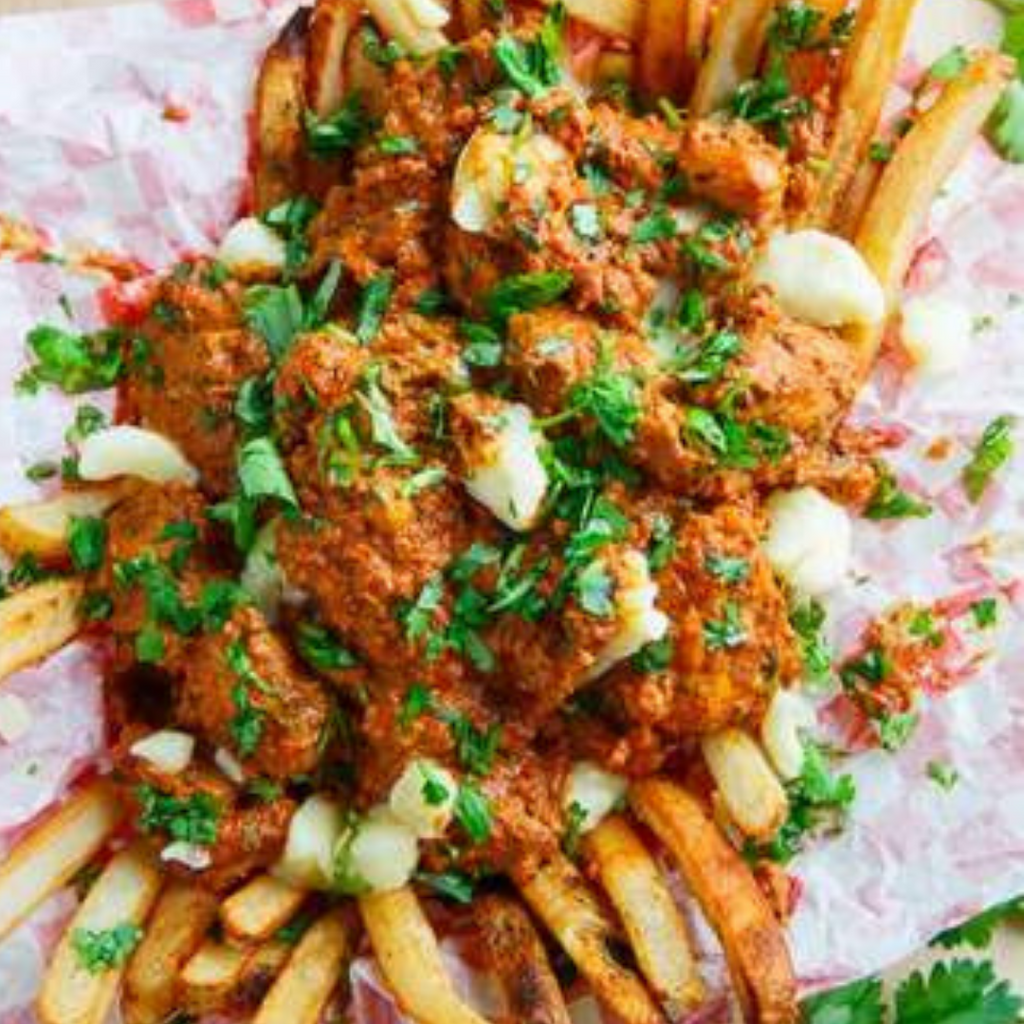 Butter chicken poutine with cheese curds 